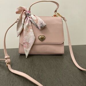 Chic Pink Crossbody Bag with Heart Detail